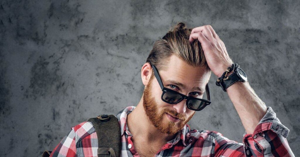 Edgar cut with messy textured top and straight fringe for men