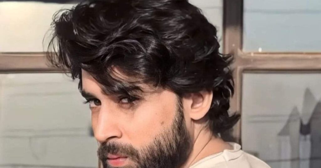 Long slick back hair mens with messy texture and relaxed flow