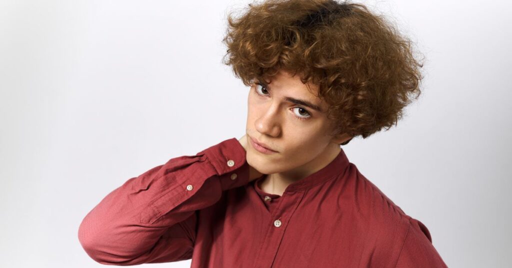  Messy curls with a taper fade