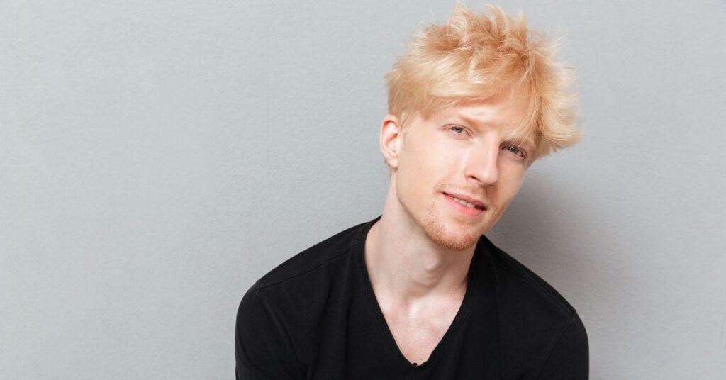 Messy side-swept fringe hair mens with textured layers