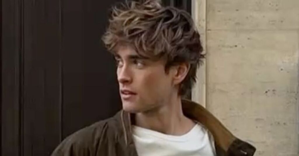 Modern mod cut with a groomed beard and textured layered fringe