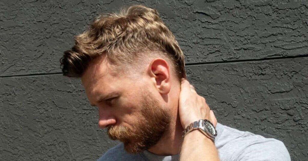 Modern mullet short hair mens with messy textured back