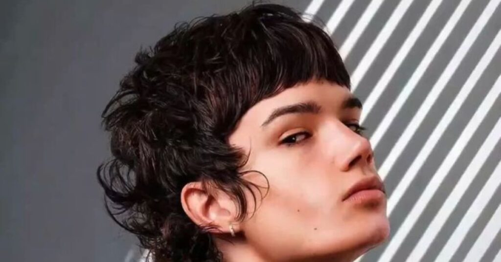 Short choppy mod cut with cropped sides and messy texture.