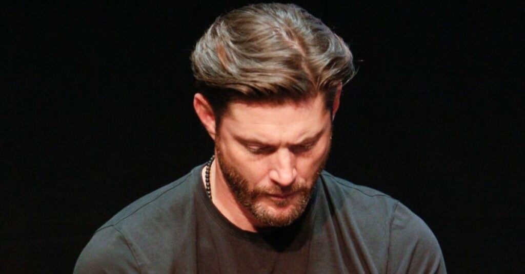 Classic side part for long hair with relaxed layers and natural volume for men.