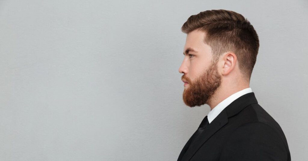 Side part with taper fade for men featuring clean layers and gentleman's grooming style