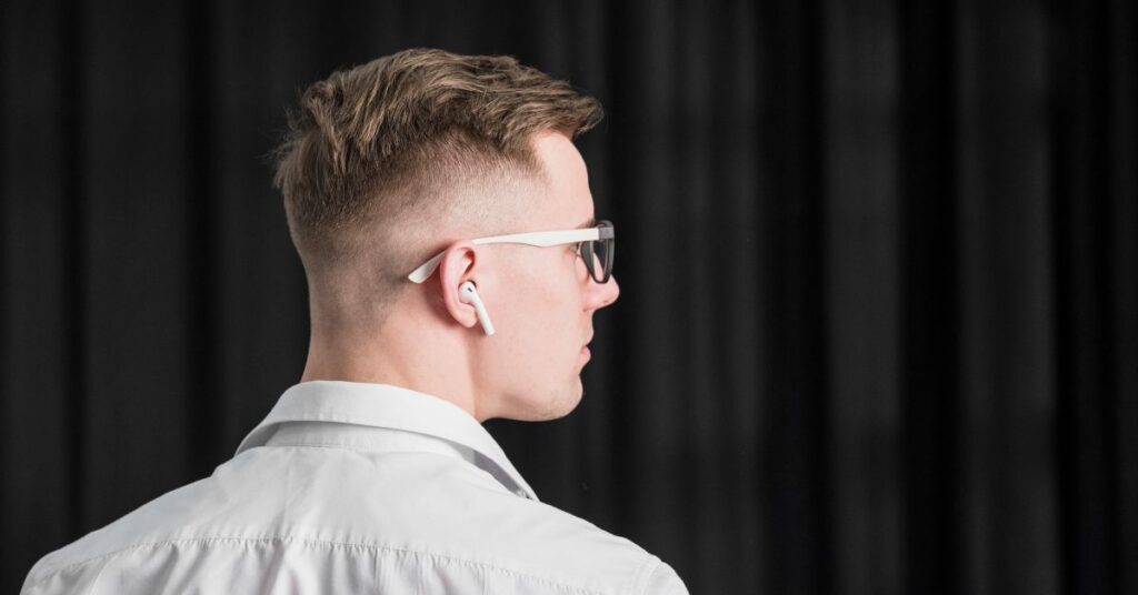 Slicked back with a taper - medium length hairstyles for men