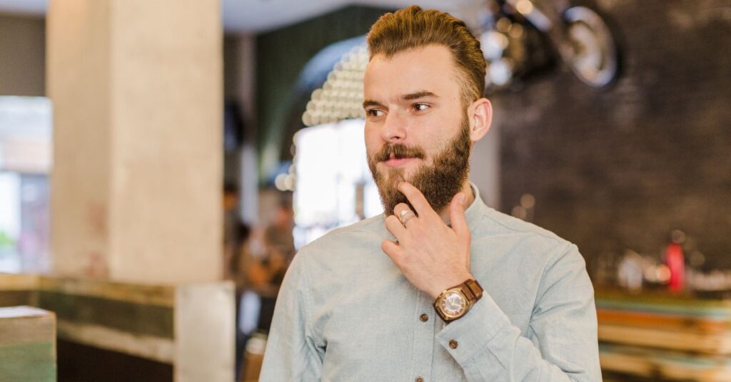 A classic short shag haircut for men featuring choppy layers and textured ends for a messy, low-maintenance look.