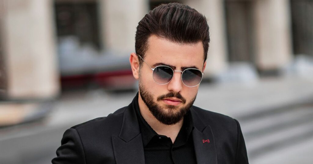 Textured wolf cut for men - modern medium length hairstyles for men guide