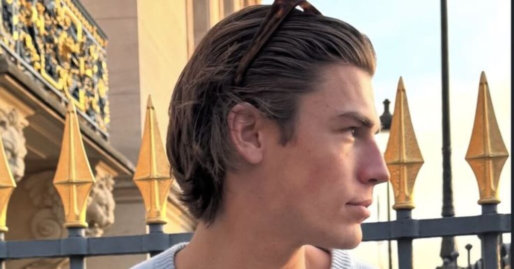 Shaggy high fade haircut for men with a blurry skin fade on the sides and a messy textured layered top.