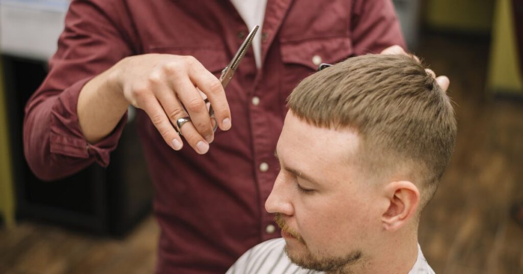 Thick hair shag for men with deep de-bulking layers, a heavy textured fringe, and maximum movement to reduce hair weight.