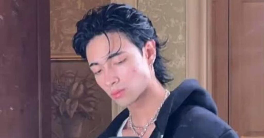 Wolf cut for men with shaggy layers and messy volume for a wild look