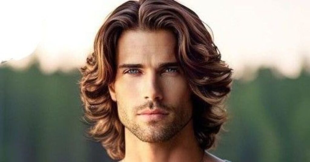 Thick and shaggy layered shag cut for men with heavy texture and retro fringe