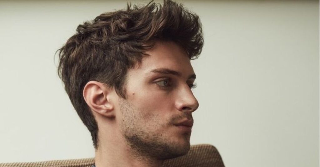 Wind-swept waves hair mens with natural messy texture and flow