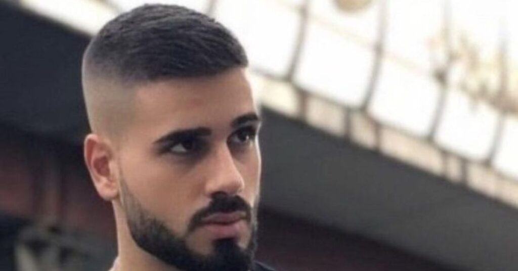 Curly Caesar cut with short textured fringe