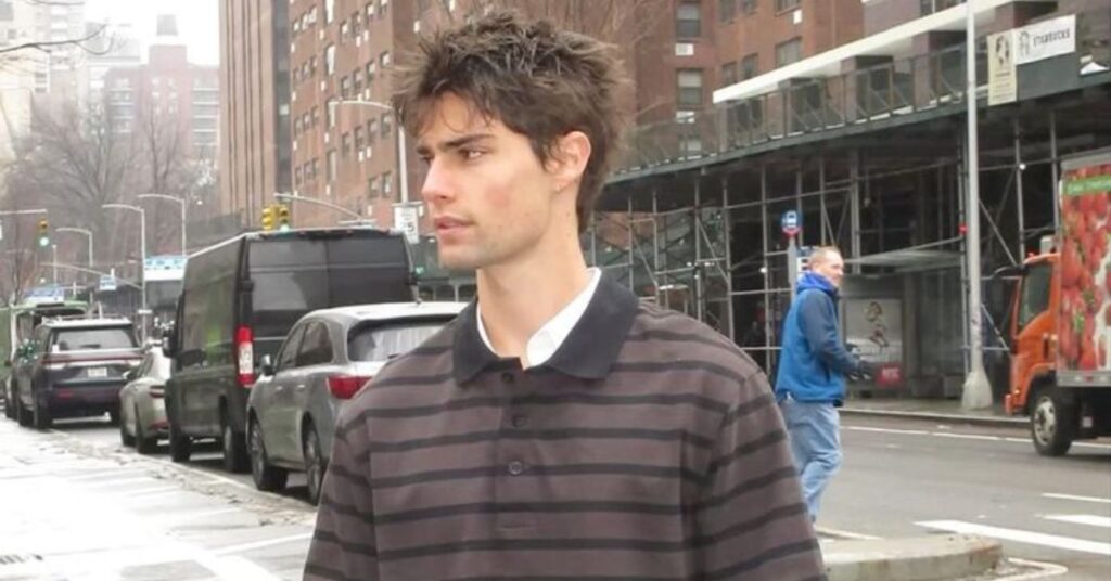 Trendy forward-swept fringe for men with voluminous texture and clean-cut sides.