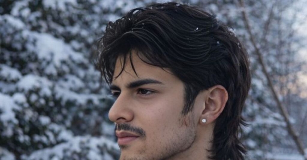 Modern curly mullet with low taper fade