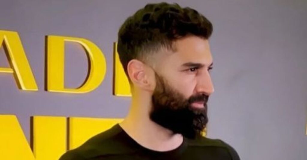 Temple taper fade for guys with curly hair