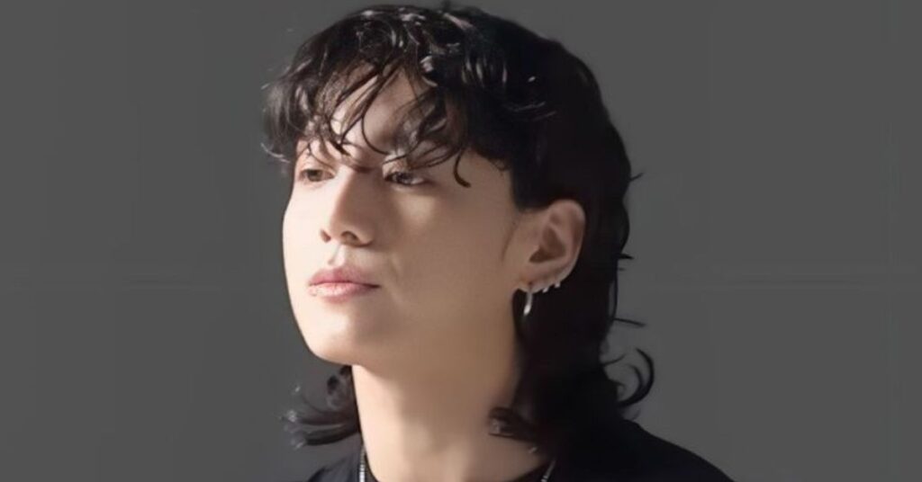 Asian Modern Mullet with straight textured layers and a clean taper fade.