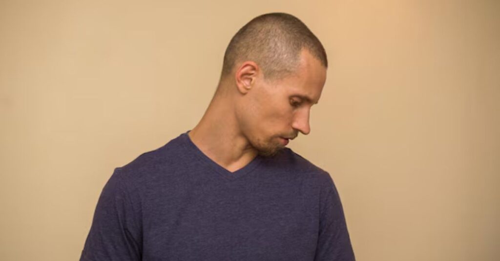 Bald fade crew cut with crisp modern finish