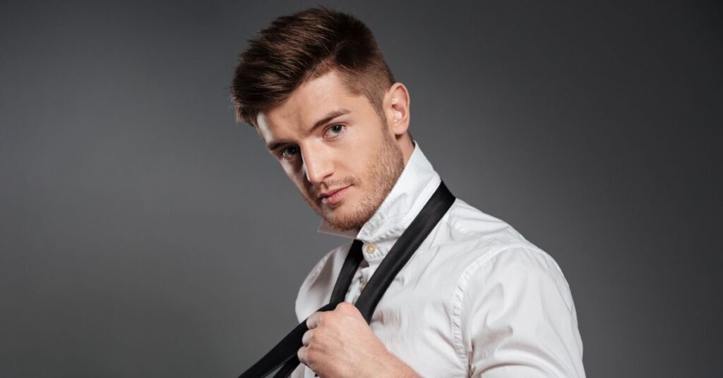 Professional classic comb over for men with scissor-cut sides and a natural side part.
