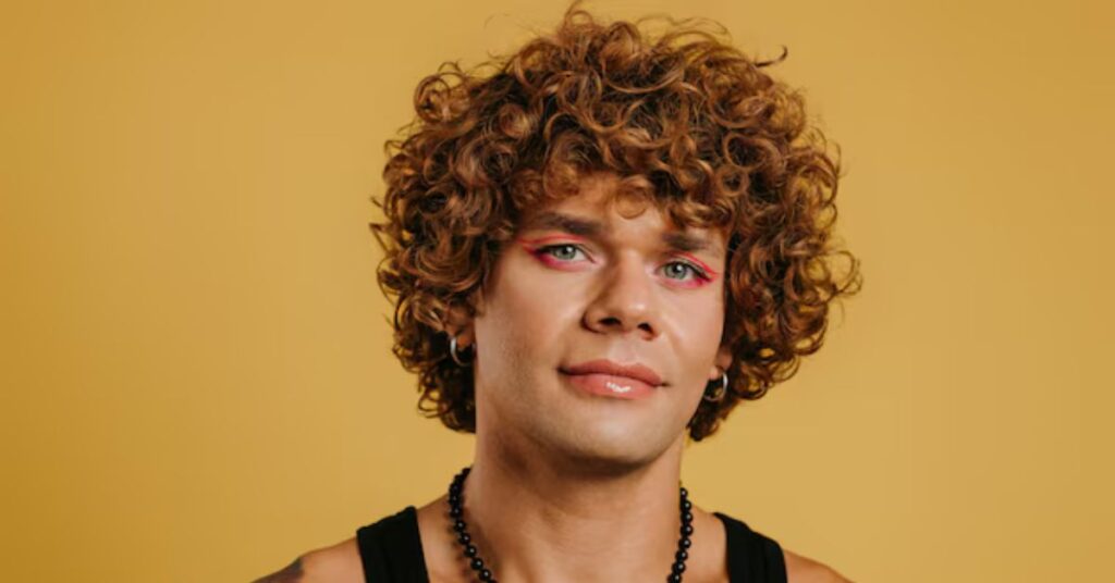 Shiny defined spiral curls styled for a glamorous, high-bounce finish.