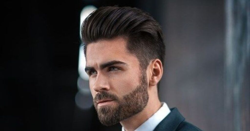 High-volume pompadour styled with a blow-dryer for men with straight hair.