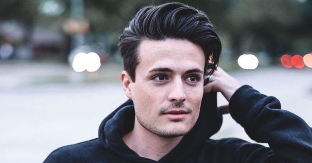 Professional medium length comb over for men with natural volume and a soft side part.