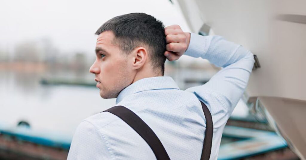 Professional crew cut haircut with high taper fade for a clean athletic look.