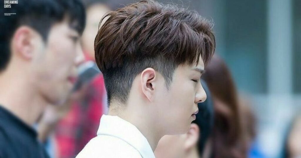 Modern Two-Block Korean hairstyle cut with disconnected sides and textured top.