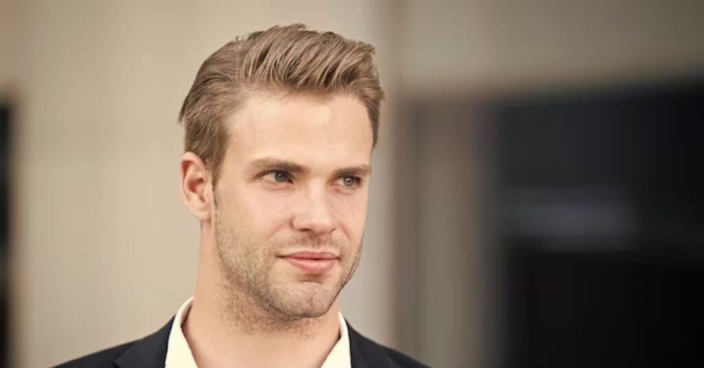 Neat low textured bun styled for a professional office environment.