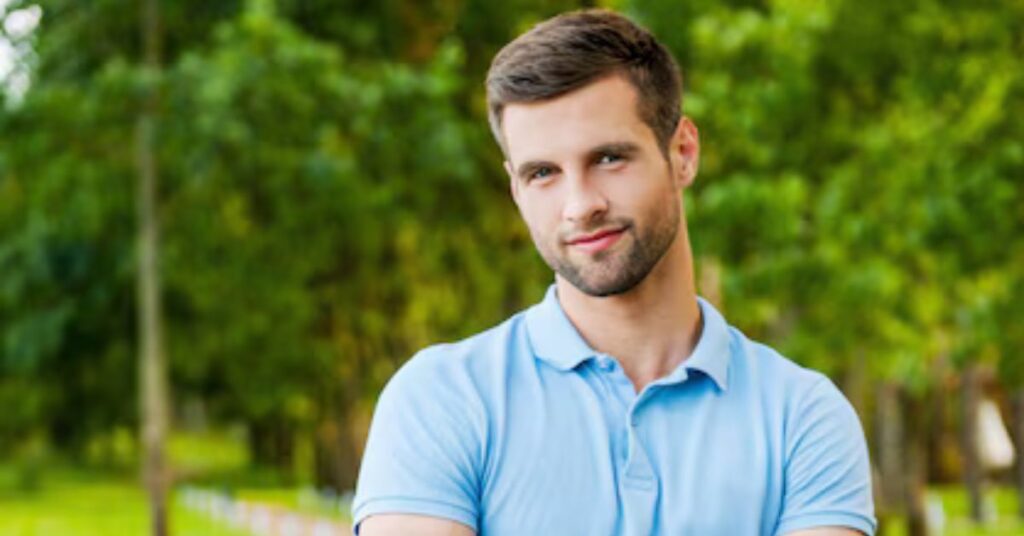 Short top comb over with subtle fade and neat finish