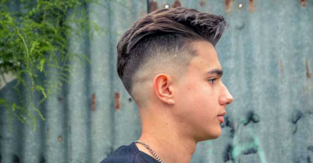 Modern 2026 side part mullet with short sides and long back.