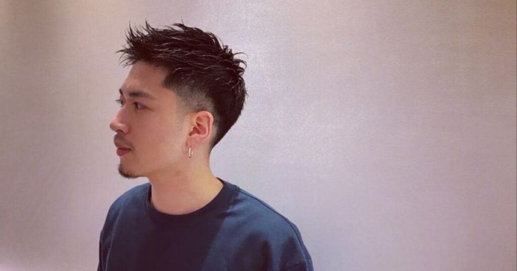 Edgy Spiky Punk Korean hairstyle cut with sharp textured layers and strong hold.