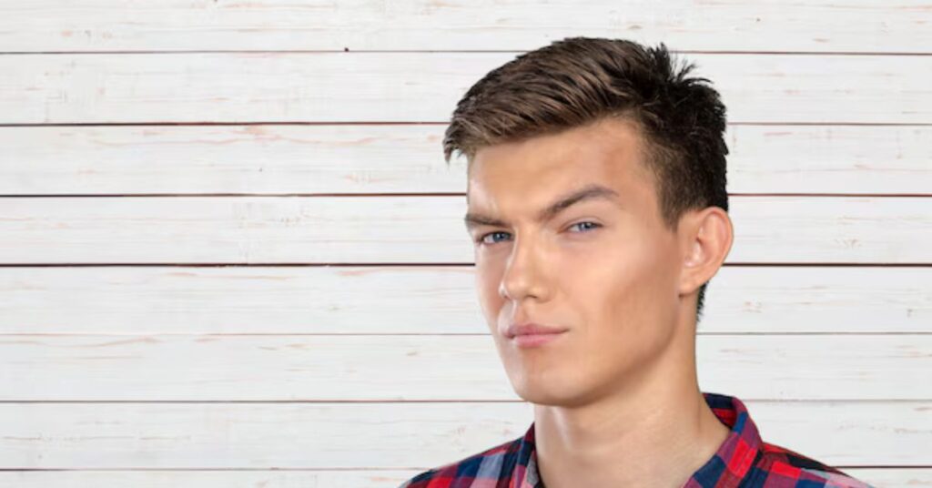 Messy layered quiff with high contrast fade for thick hair.