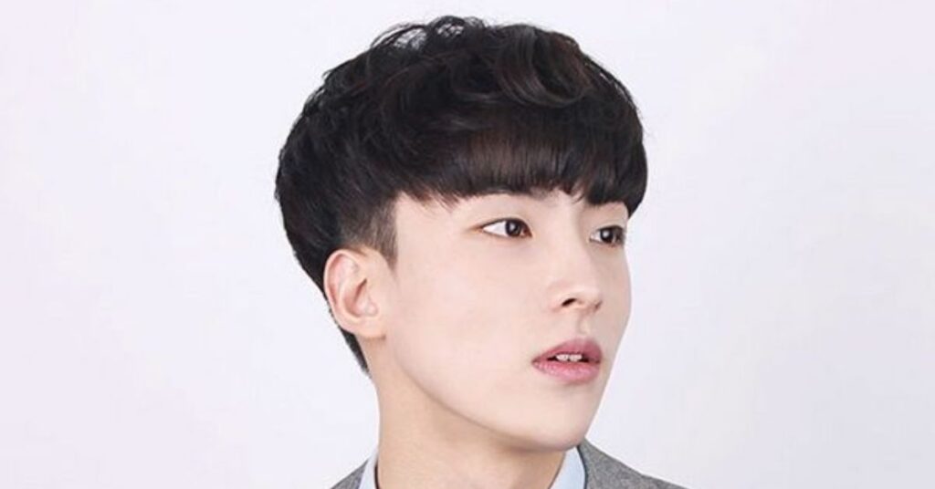 Textured Mash or Bowl Korean hairstyle cut for a modern youthful aesthetic.