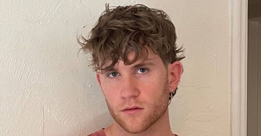 Structured modern mullet haircut for thick coarse hair.