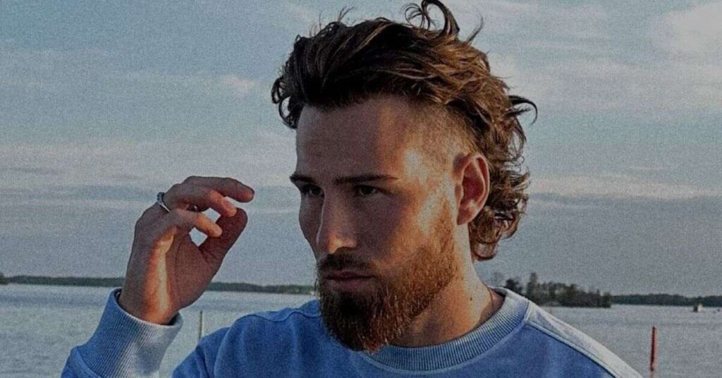 Euro-Fade Mullet with blunt fringe and skin fade.