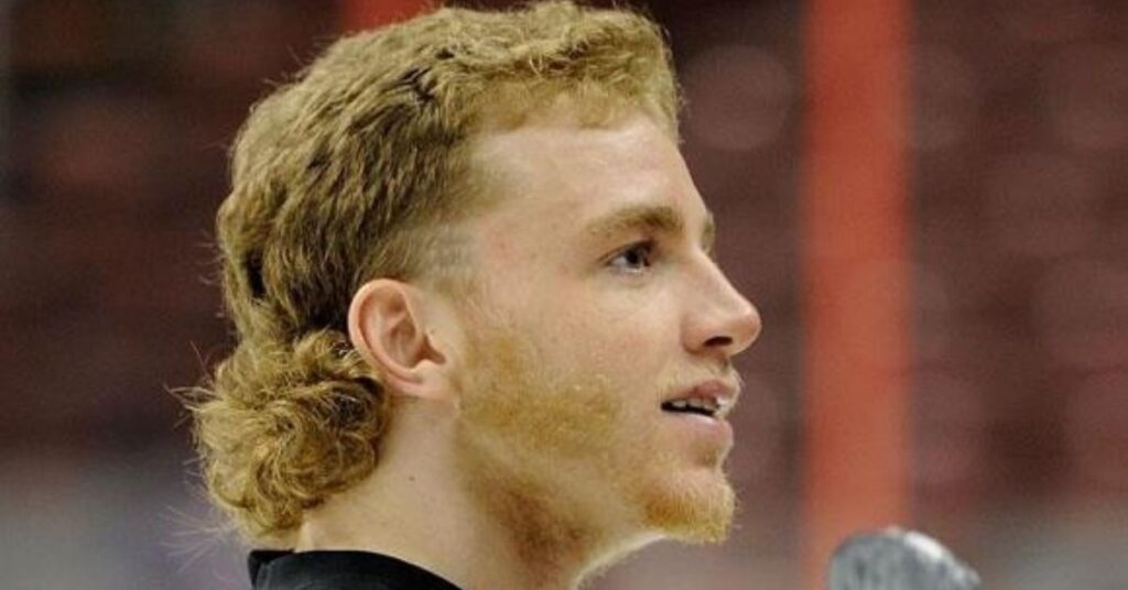 Casual messy bedhead modern mullet.