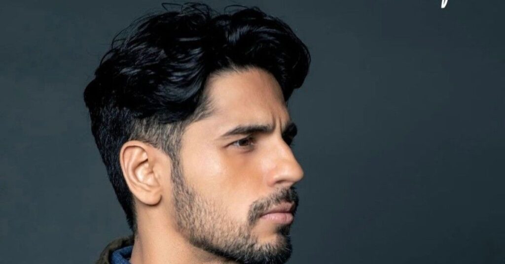 90s middle part modern mullet haircut.