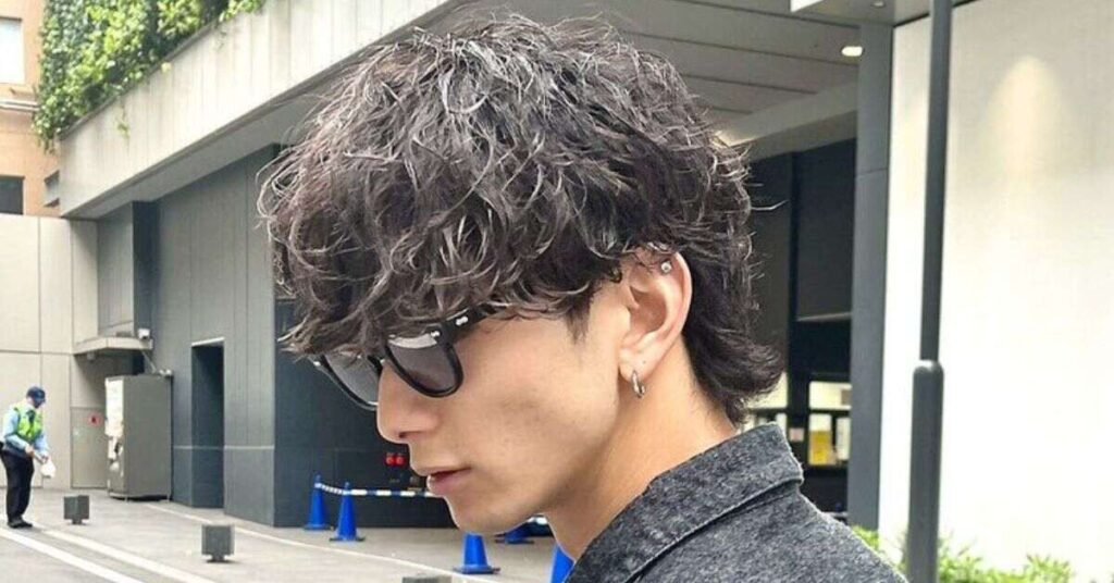 Textured Shadow Perm Korean hairstyle cut showing deep waves and volume.