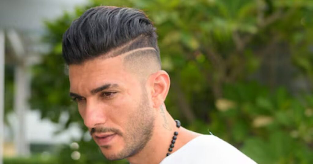 Disconnected undercut mohawk with sharp high fade transitions.