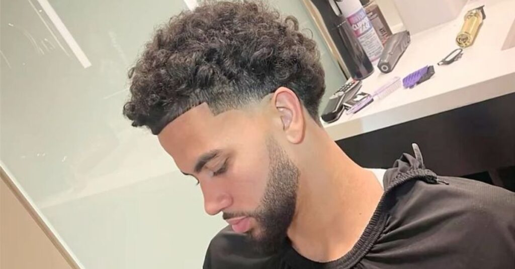 Afro Temple Taper Blowout Haircut